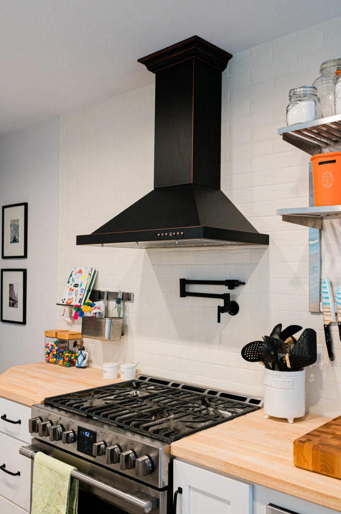 black range hood white kitchen