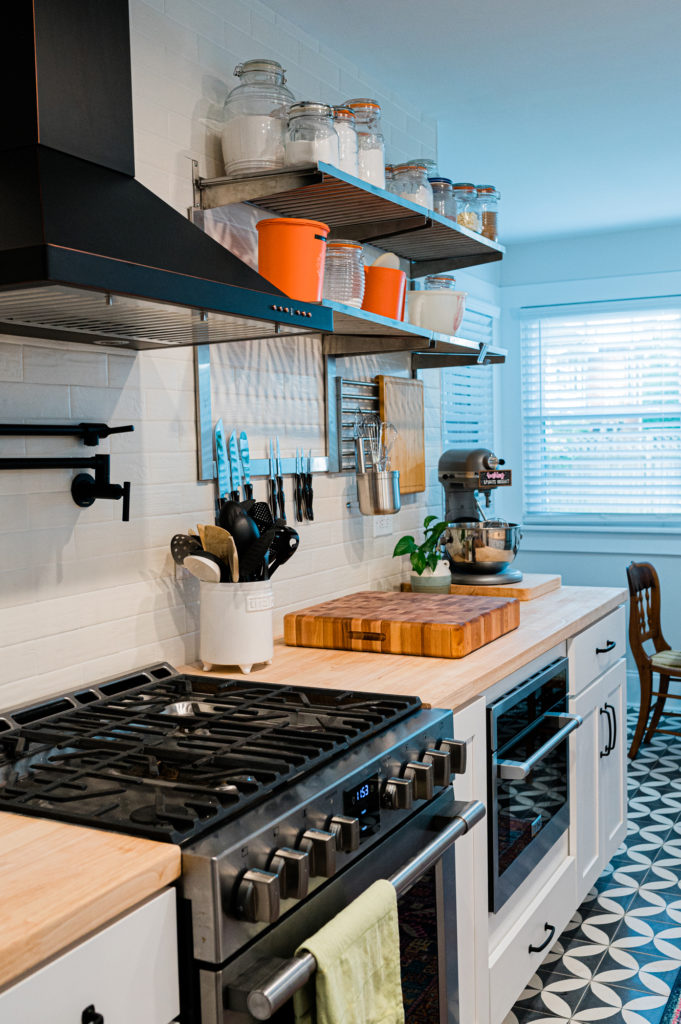 butcher block countertops and white cabinets